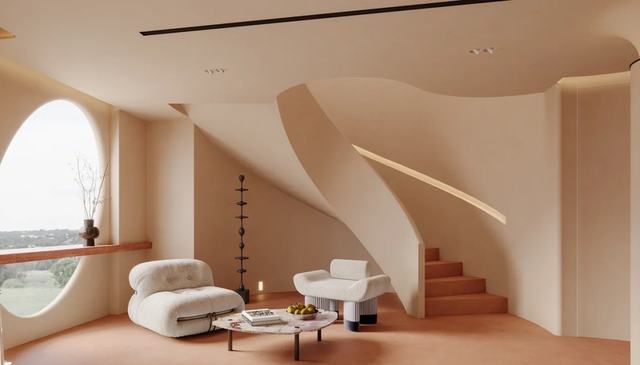 Microcement walls and stair around a round window