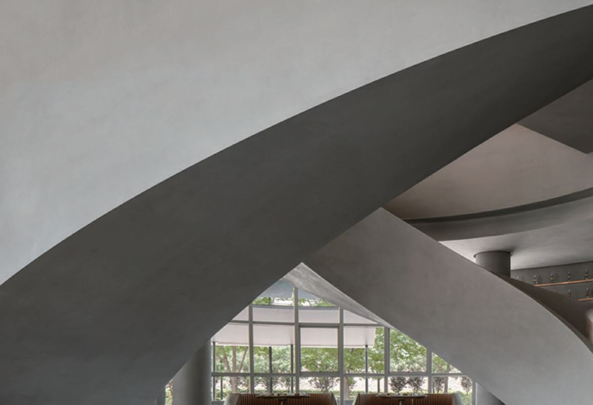 Microcement on a curved stair and wall
