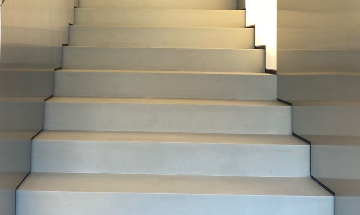 Microcement treads and risers on a straight stair