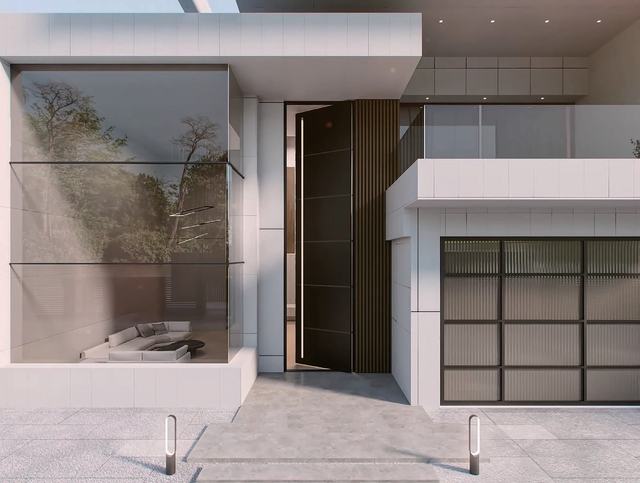 Entry door beside a glazed sectional garage door
