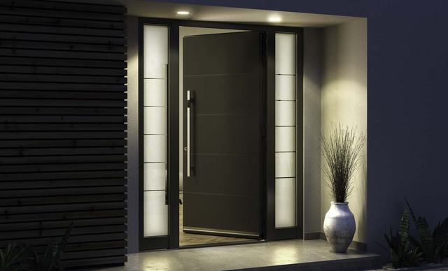 Entry door with frosted side lights at night