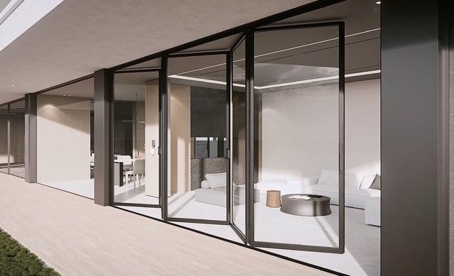 Folding glass wall opening a living room to a terrace